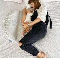 Breastfeeding lying down. Side lying breastfeeding. Breastfeeding position lying down. Lying down breastfeeding newborn. Feeding baby lying down. Baby can't roll off bed when lying down due to award-winning safety features of our Breastfeeding Nursing Nest BellaMoon Half Moon. Breastfeed in comfort. Make breastfeeding easier